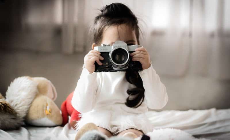 Girl photographer with camera